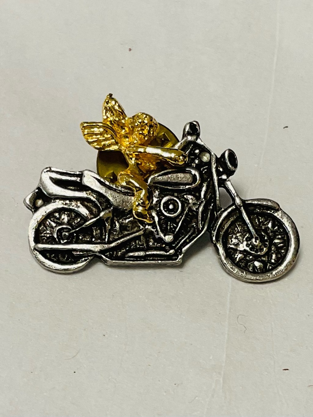 Vintage Guardian Angel on Motorcycle Pin.